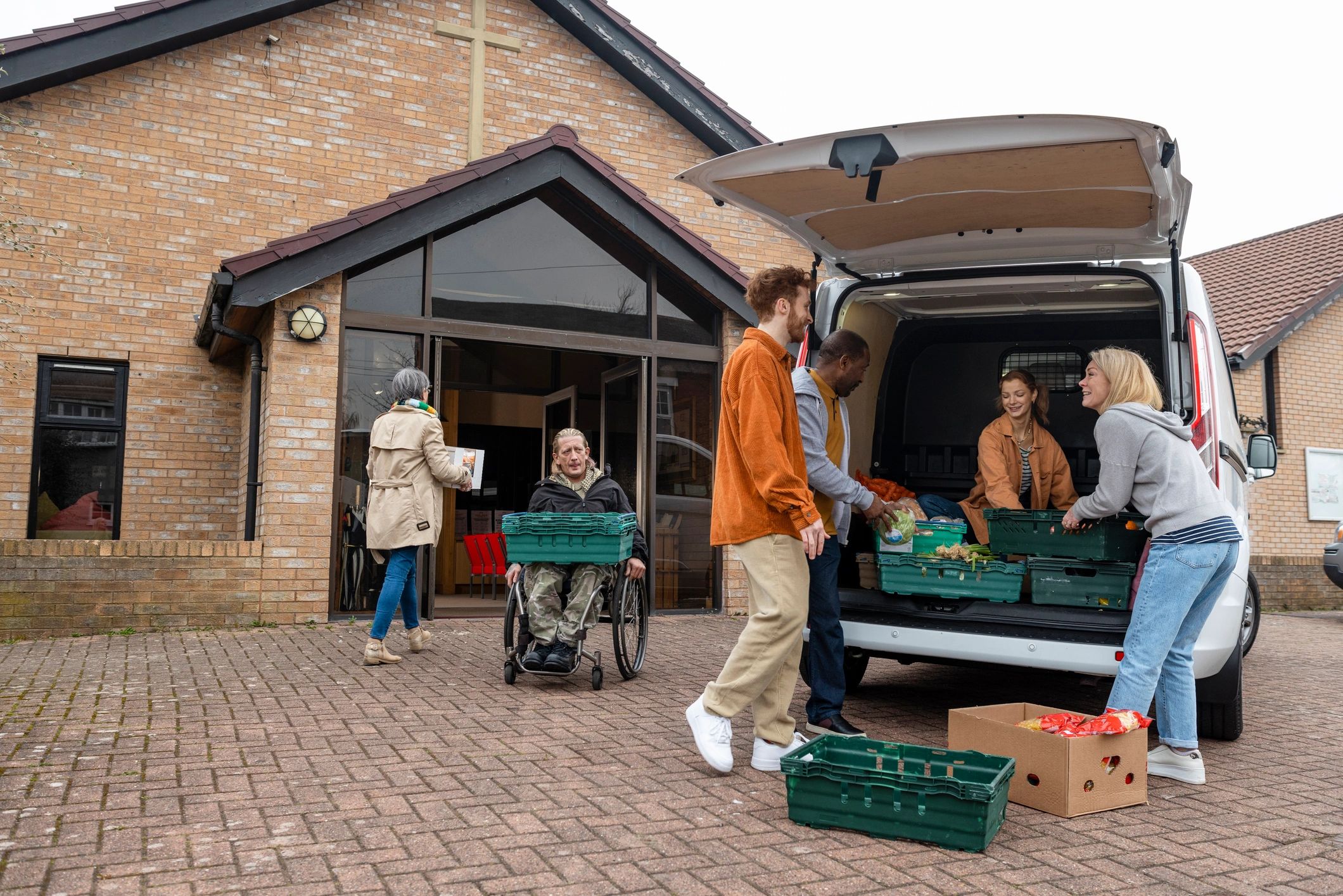 Community volunteers unloading food donations